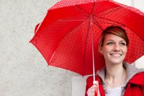 Portrait of woman with umbrella — Stock Photo