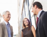 Business people talking outdoors, selective focus — Stock Photo