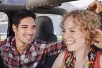 Couple riding in jeep together — Stock Photo
