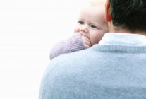 Father carrying infant son — Stock Photo