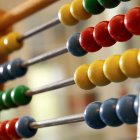 Close up of colorful traditional wooden arithmetic abacus — Stock Photo