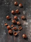 Hazelnuts on wooden board — Stock Photo