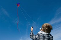 Small Boy flying a kite — Stock Photo