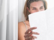 Portrait of Woman reading a letter — Stock Photo