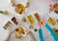 Overhead view of people at table — Stock Photo
