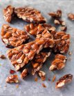 Close up shot of almond brittle candy — Stock Photo