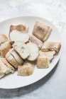Ceramic dish filled with bread slices — Stock Photo
