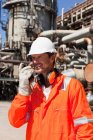 Worker with walkie talkie on site — Stock Photo