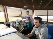 Air traffic controllers in tower — Stock Photo