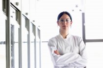 Portrait of female scientist wearing protective goggles — Stock Photo