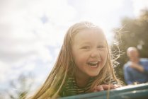 Portrait of girl looking at camera smiling — Stock Photo