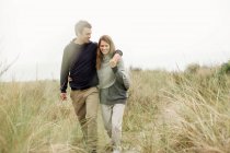 Walking in the sand dunes — Stock Photo