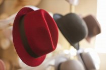 Row of hats in traditional milliners shop — Stock Photo