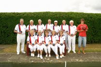 Bowls team plus am odd one out — Stock Photo