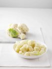 Raw and boiled cauliflower — Stock Photo