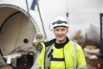 Portrait of engineer at wind farm construction site — Stock Photo