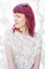 Portrait of feminine young woman with pink hair — Stock Photo