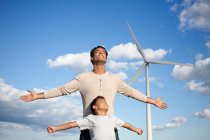 Father and son on a windfarm — Stock Photo