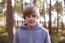 Portrait of a boy in the woods — Stock Photo
