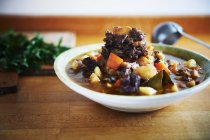 Jamaican oxtail stew in plate, close up shot — Stock Photo