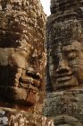 Nahaufnahme von geschnitzten Gesichtern, Bajontempel, angkor wat komplex, siem reap, Kambodscha — Stockfoto