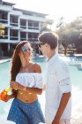 Young couple on poolside, Koh Samui, Thailand — Stock Photo