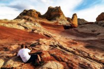 Photographer photographing White Pocket rock formation, Page, Arizona, USA — Stock Photo