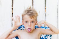 Close up of boy making face — Stock Photo