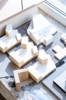 Top view of wooden architectural model in bright sunlight — Stock Photo