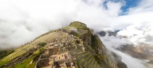 Nuvens baixas em Machu Picchu, Peru — Fotografia de Stock
