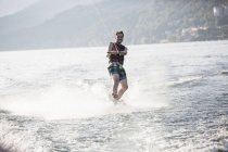 Waterskier waterskiing, Maggiore lake, Verbania, Piedmont, Italy — Stock Photo