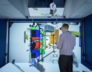 Инженер просматривает составные части машины в 3D в пакете виртуальной реальности — стоковое фото