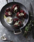 Top view of roasted beetroots with creme fraiche — Stock Photo