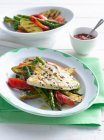Plate of fish and vegetables — Stock Photo