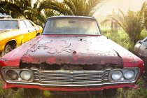 Front view of vintage car in scrap yard — Stock Photo