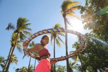 Young woman with plastic hoops — Stock Photo