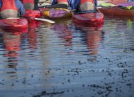 Group of people in kayaks, rear view — Stock Photo