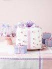 Close up of Christmas presents on table — Stock Photo