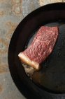 Fillet of meat cooking in frying pan — Stock Photo