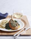 Still life of pork chop with rosemary crust and mashed potatoes — Stock Photo