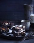 Rustic tray with sliced pecan brownies — Stock Photo