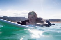 Surfer in the water, Bay of Islands, NZ — Stock Photo
