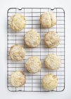 Top view of freshly baked scones on cooling rack — Stock Photo