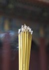 Incense burning in buddhist temple, Thailand, Bangkok — Stock Photo