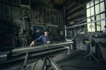 Portrait of welder in workshop interior — Stock Photo