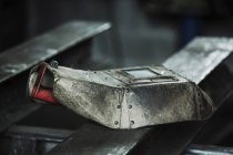 Welding iron visor on a metal pipe — Stock Photo