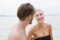 Young couple laughing on beach, Kradan, Thailand — Stock Photo
