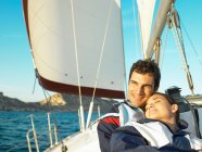 Young couple relaxing on yacht — Stock Photo