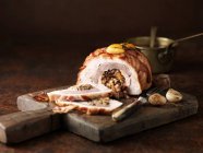 Three bird roast with garlic rosemary, apricot and bacon — Stock Photo
