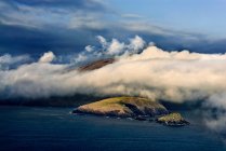 Scenic view of Clouds over rural islands — Stock Photo